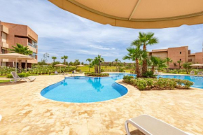 Luxury Garden-Level Apartment with Poolside Serenity